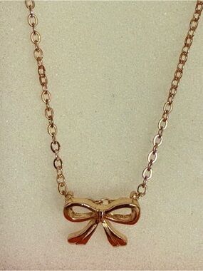 Delicate Gold Bow Pendant Necklace - Women's Jewelry